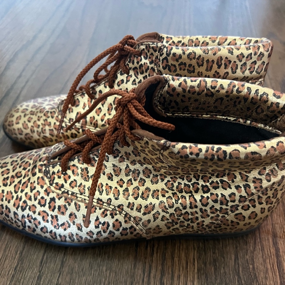 Vintage metallic lace up booties.